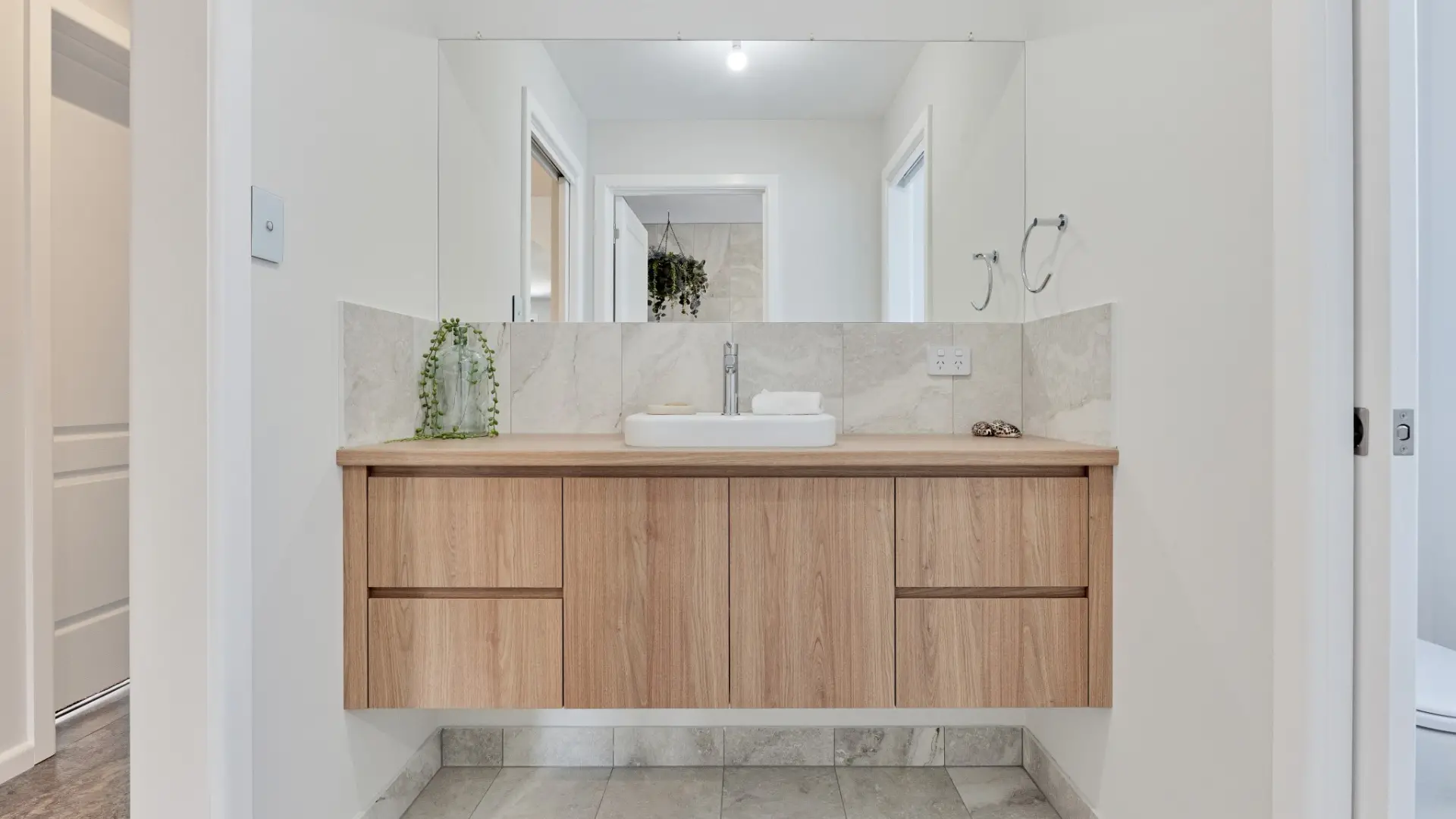 Modern Timber look vanity in modular home