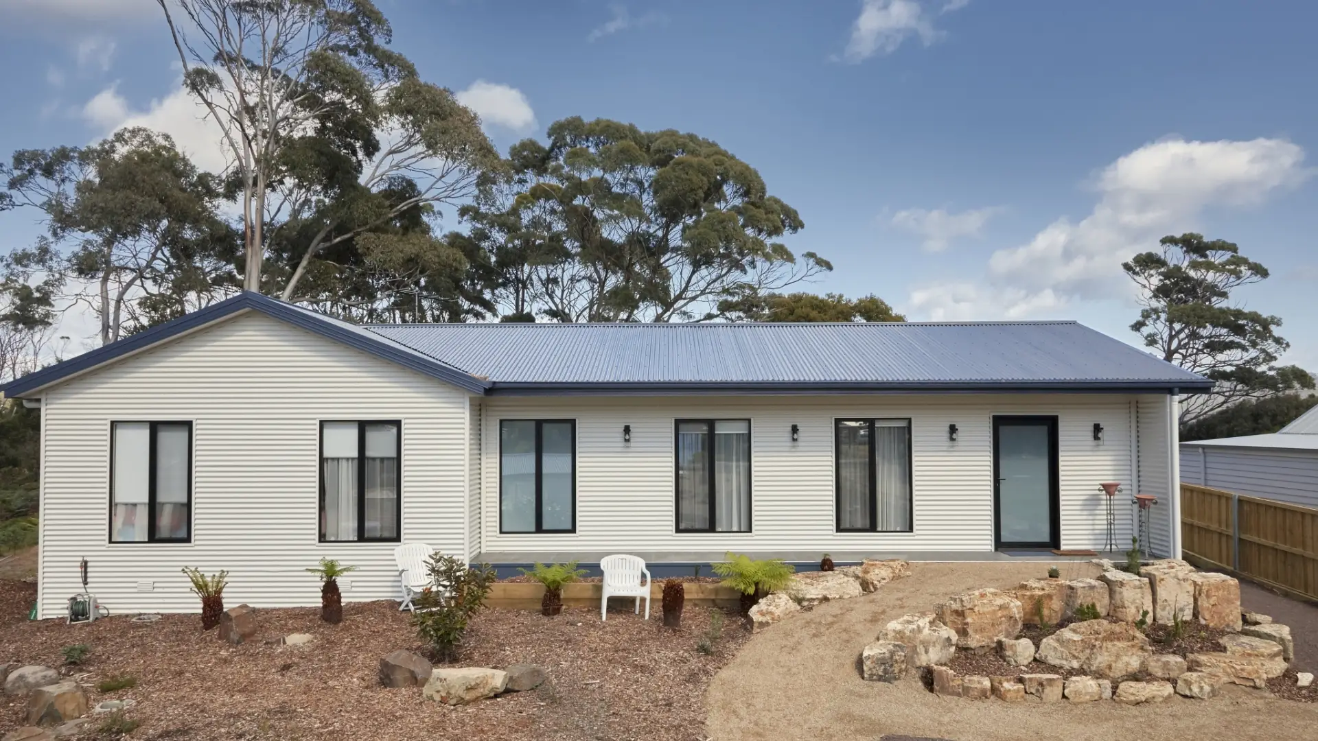 Black windows with white colourbond
