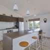 Brown and White Kitchen in Modular Home