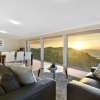 Living room with view of Tasmanian sunset
