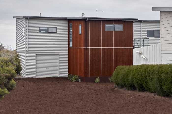 Contrasting Timber and Colorbond Cladding Home with Internal Garage Access