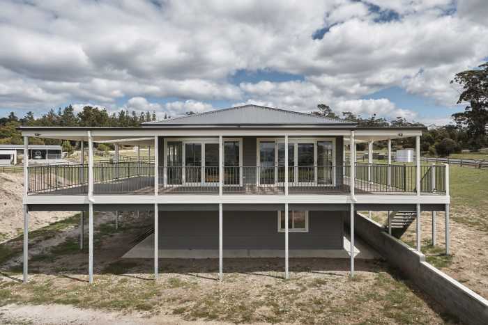 Two-Story Weatherboard Home with Wide Verandah