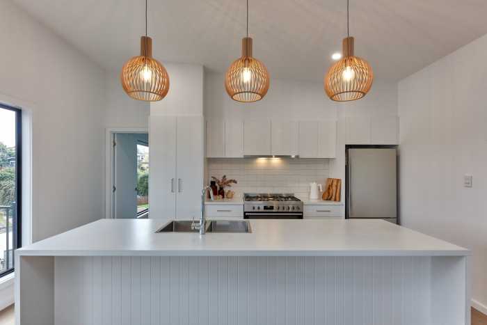 Modern White Kitchen with Feature Pendant Lights