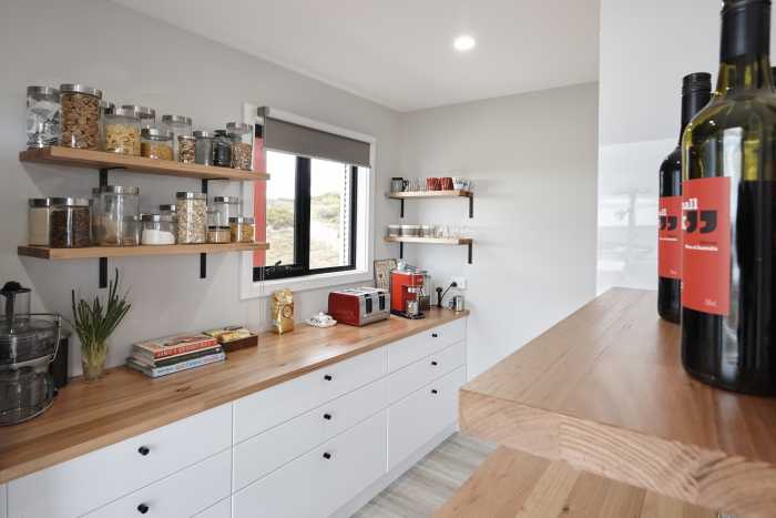 Walk-In Pantry with Open Shelving in Bellbouy Modular Home
