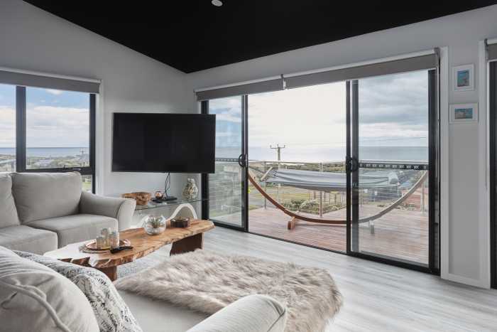 Modern Beachside Home with Black Ceiling