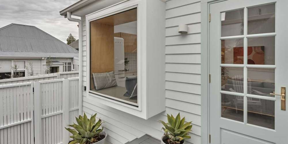 Cement weatherboard with grey finishes